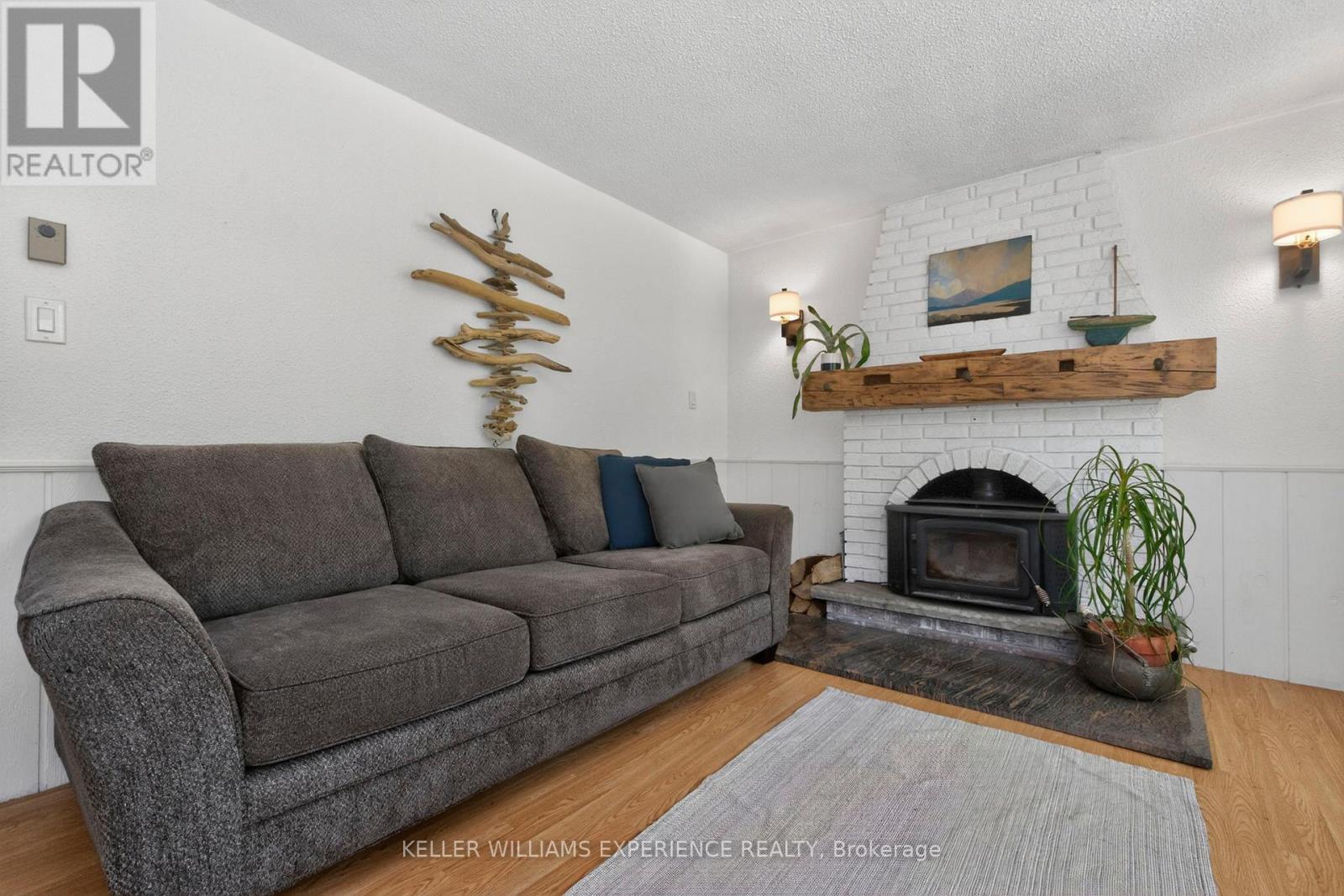 181 Park Road, Tiny, ON - Indoor Photo Showing Living Room With Fireplace