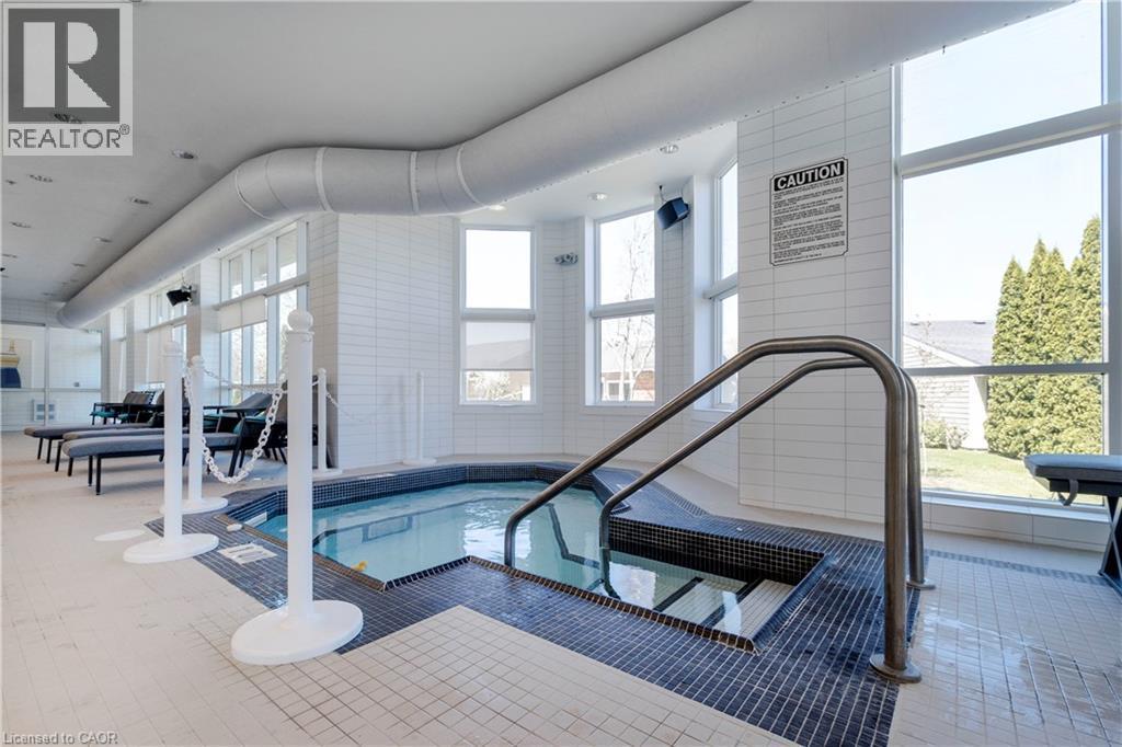 Hot Tub located in St. Elizabeth Village - 82 Szollosy Circle, Hamilton, ON - Indoor Photo Showing Other Room With In Ground Pool