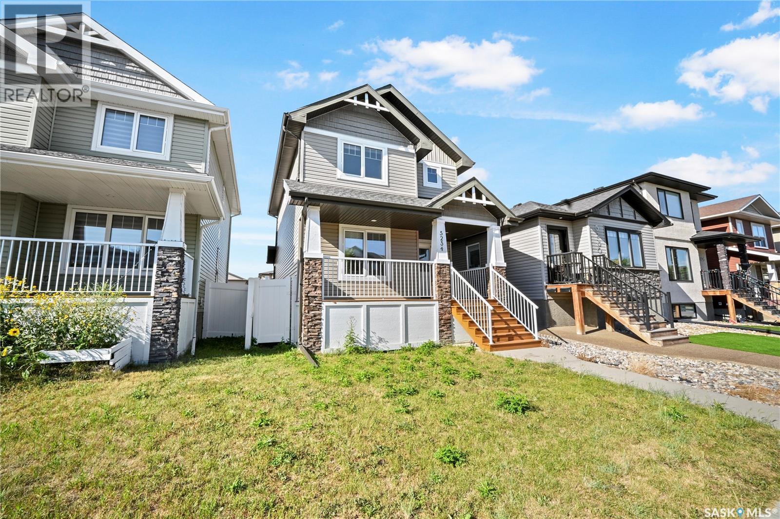 5234 Campling Avenue, Regina, SK - Outdoor With Deck Patio Veranda With Facade
