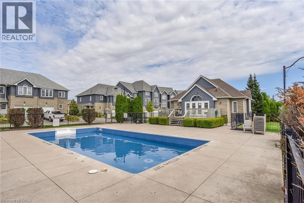 199 Saginaw Parkway Unit# 15, Cambridge, ON - Outdoor With In Ground Pool