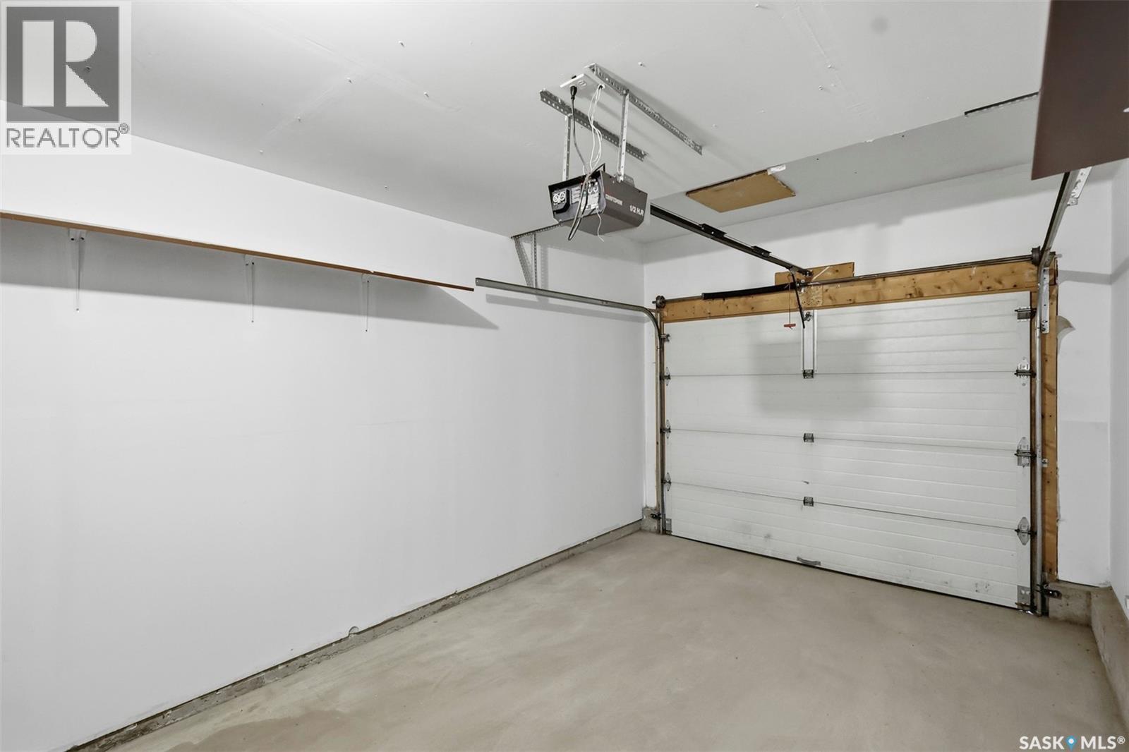 8 103 Berini Drive, Saskatoon, SK - Indoor Photo Showing Garage