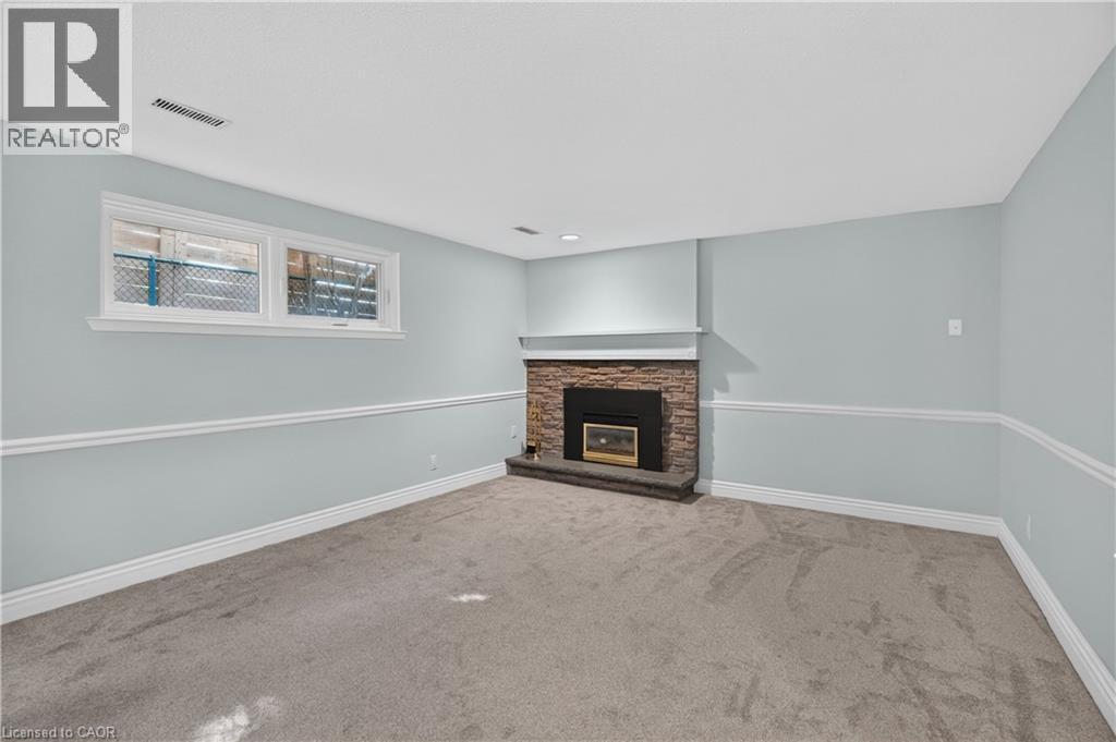3401 Rockwood Drive, Burlington, ON - Indoor With Fireplace