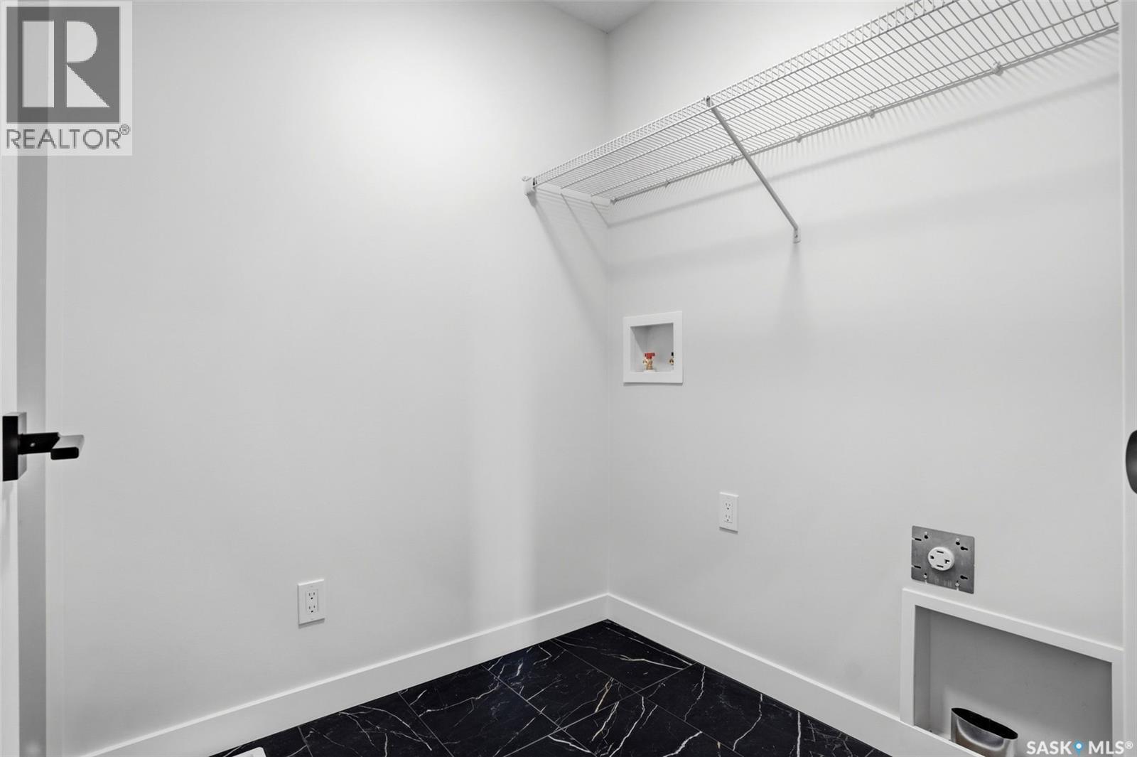 3148 Favel Drive, Regina, SK - Indoor With Storage