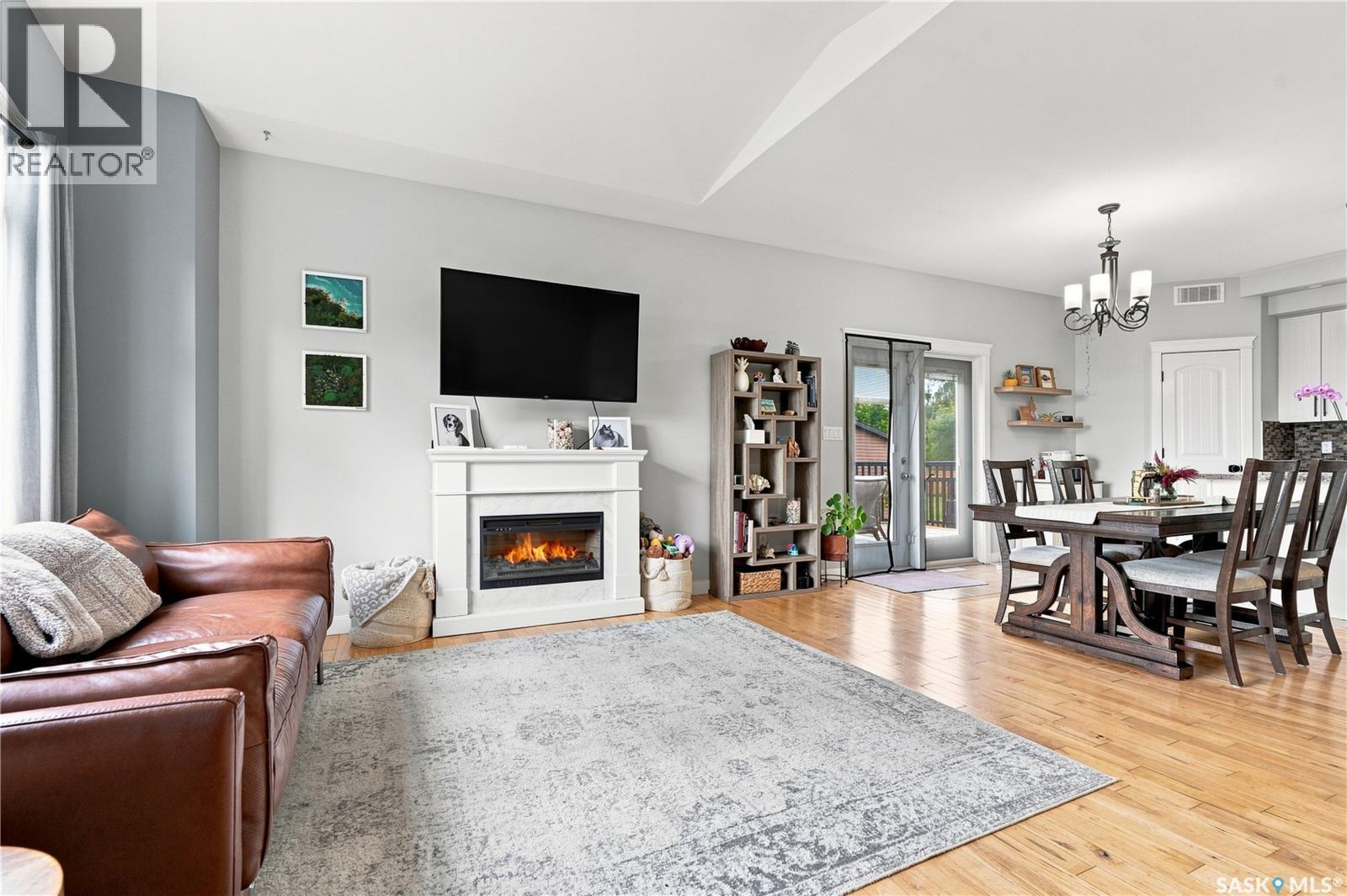 123 Railway Avenue, Dundurn, SK - Indoor Photo Showing Living Room With Fireplace
