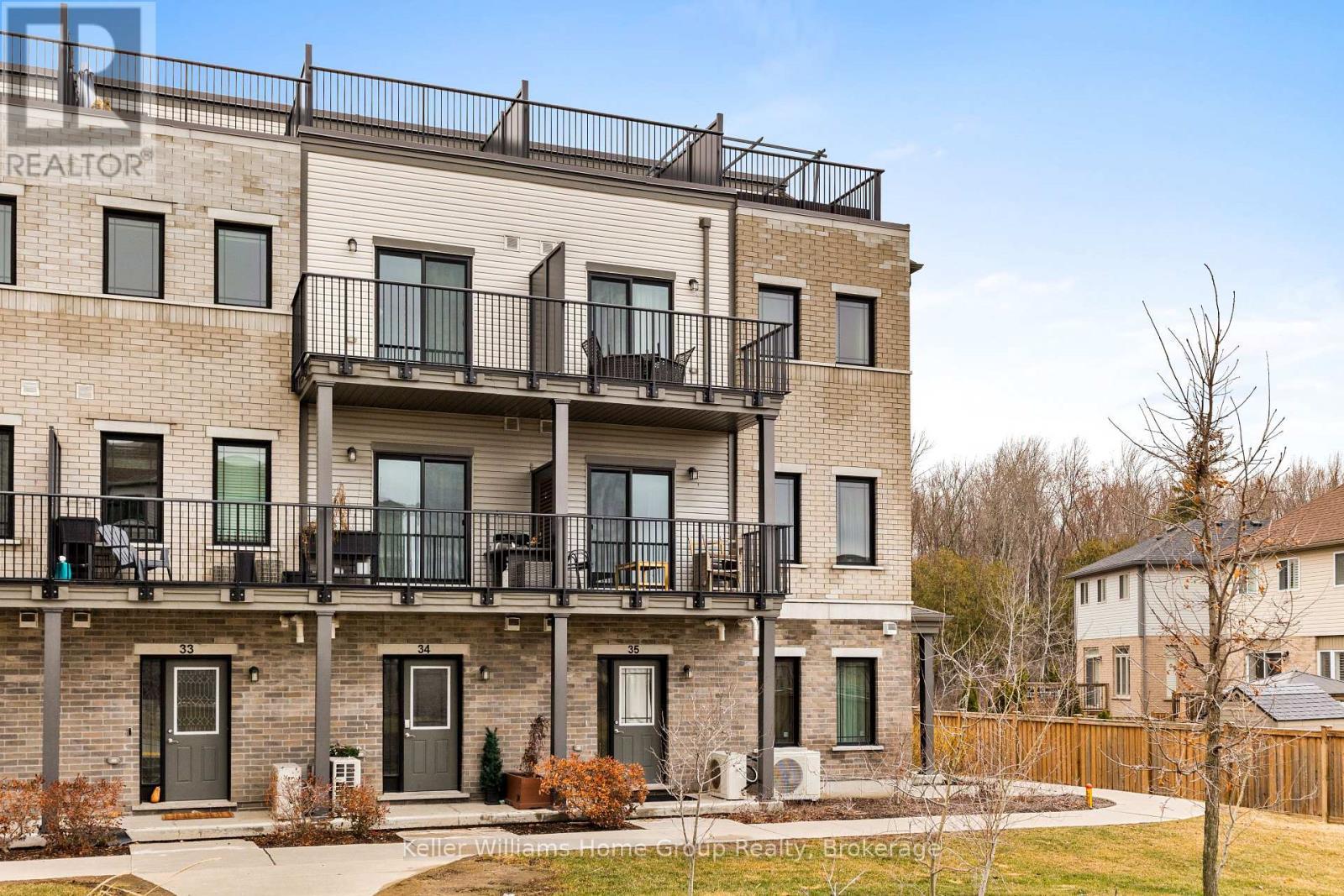 35 - 107 Westra Drive, Guelph (Willow West/Sugarbush/West Acres), ON - Outdoor With Deck Patio Veranda With Facade