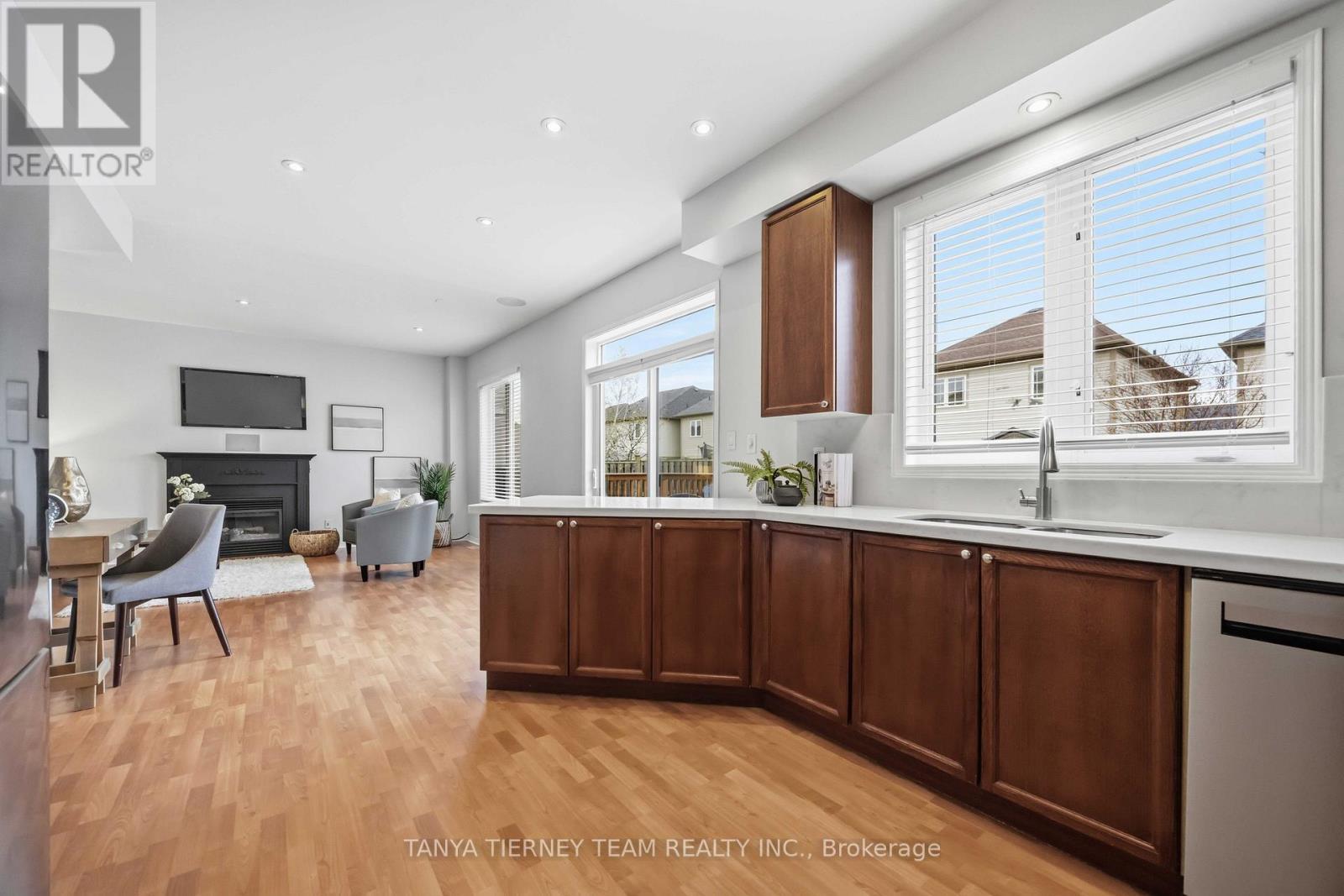75 Robert Attersley Drive E, Whitby, ON - Indoor Photo Showing Other Room With Fireplace
