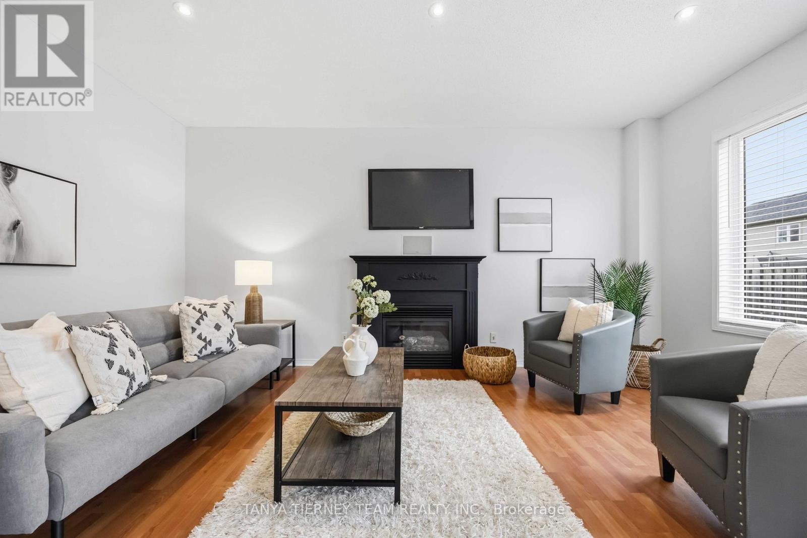 75 Robert Attersley Drive E, Whitby, ON - Indoor Photo Showing Living Room With Fireplace