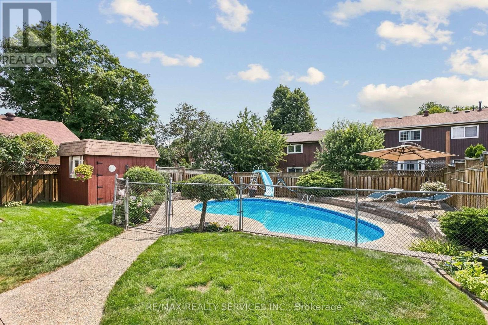 11 Longbourne Crescent, Brampton, ON - Outdoor With In Ground Pool With Deck Patio Veranda With Backyard