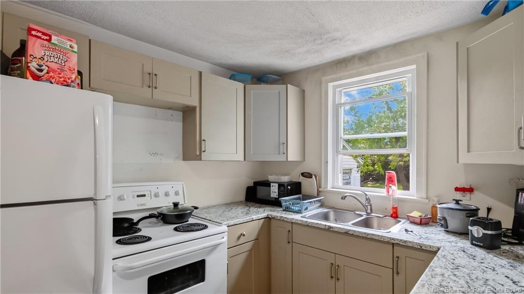 42 Railway, Moncton, NB - Indoor Photo Showing Kitchen With Double Sink