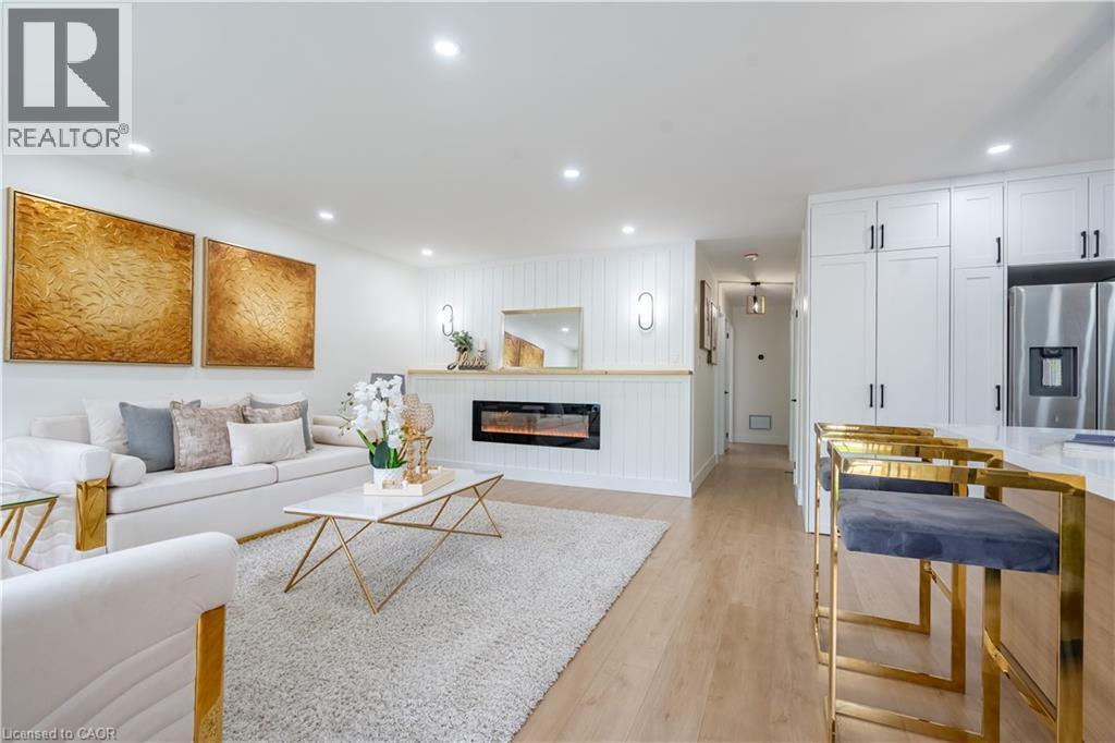 23 Tyrone Drive, Hamilton, ON - Indoor Photo Showing Living Room With Fireplace