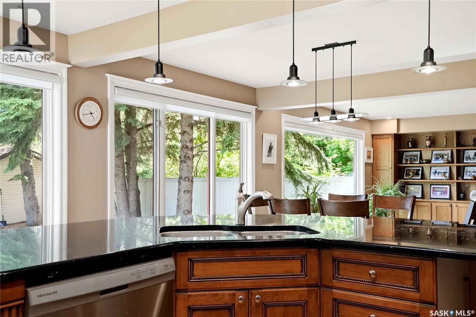 130 Mulcaster Crescent, Saskatoon, SK - Indoor Photo Showing Kitchen With Double Sink