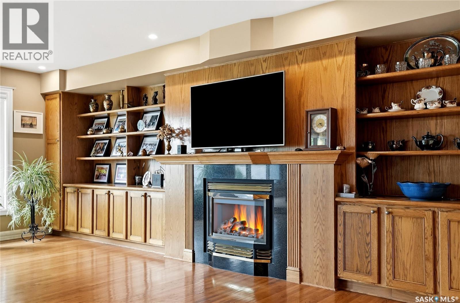 130 Mulcaster Crescent, Saskatoon, SK - Indoor Photo Showing Other Room With Fireplace