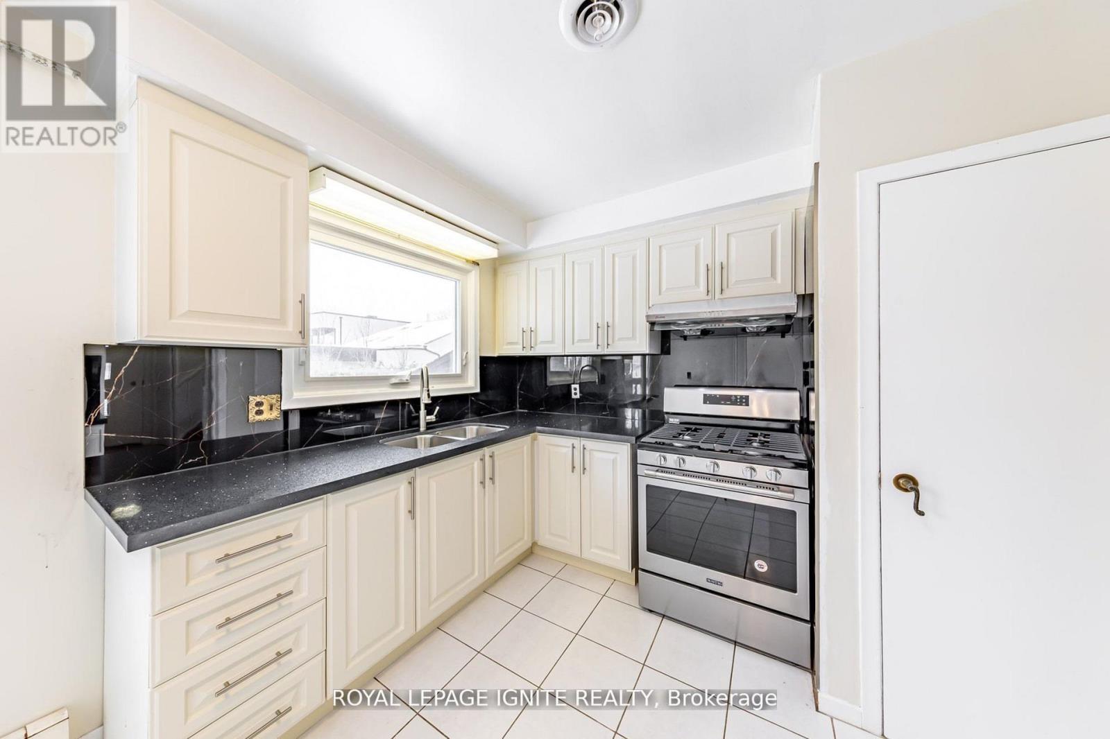 Main - 83 Deep Dene Drive, Toronto, ON - Indoor Photo Showing Kitchen With Double Sink
