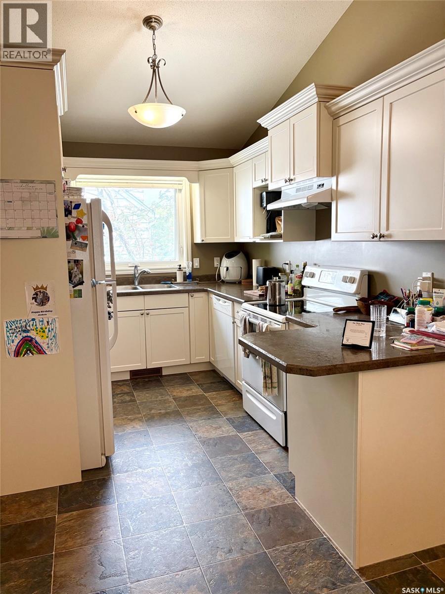 75 Agricultural Avenue, Yorkton, SK - Indoor Photo Showing Kitchen With Double Sink