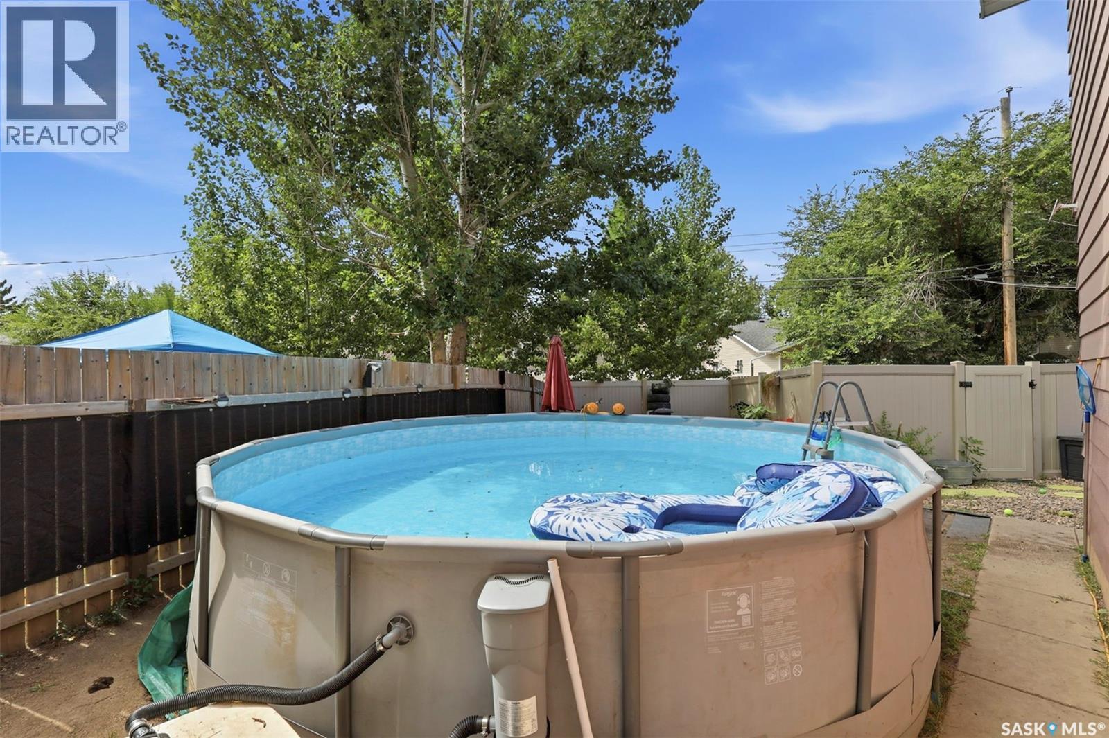 A & B 414 Gardiner Place, Saskatoon, SK - Outdoor With Above Ground Pool