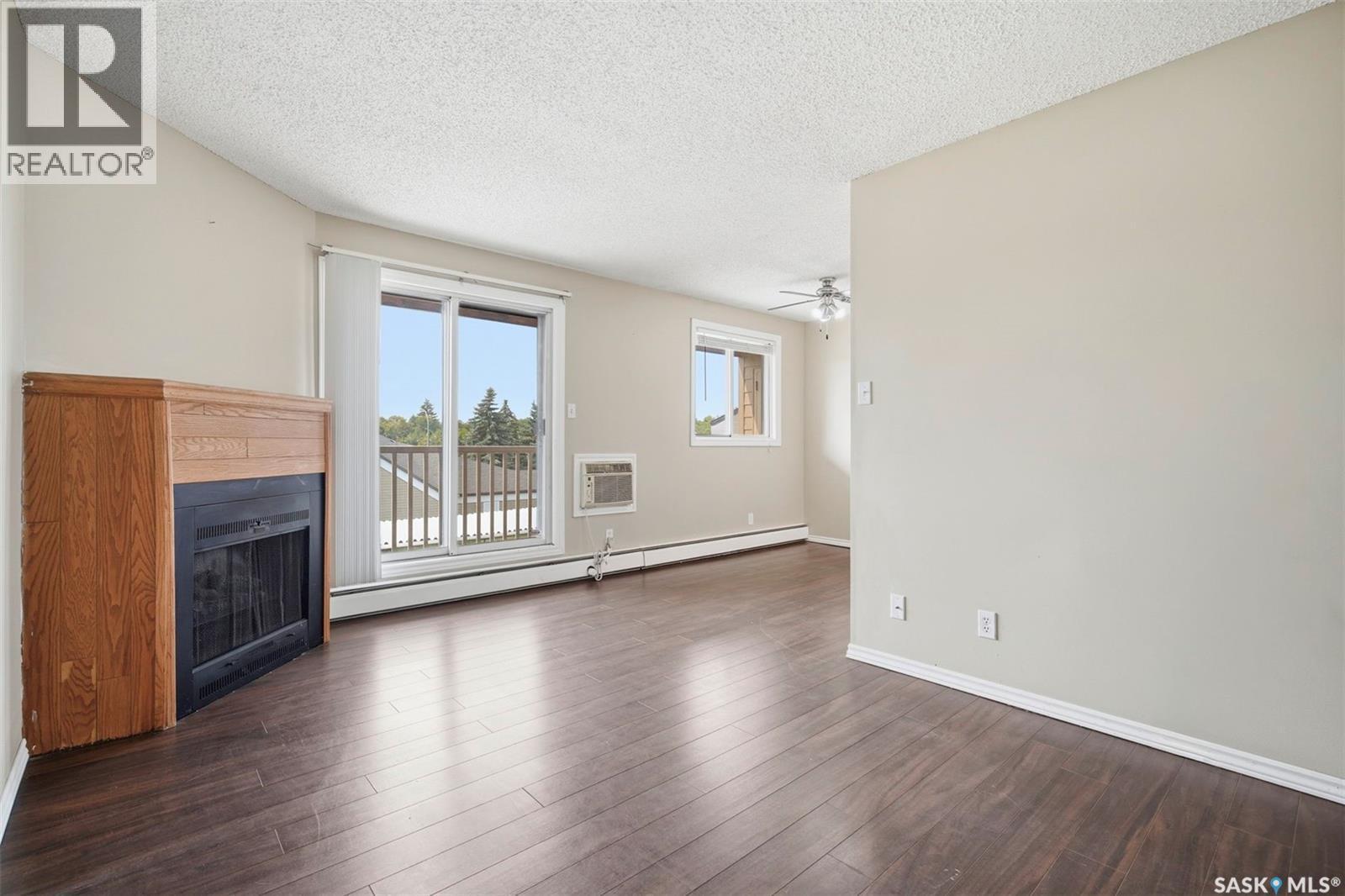 308 203 Tait Place, Saskatoon, SK - Indoor With Fireplace
