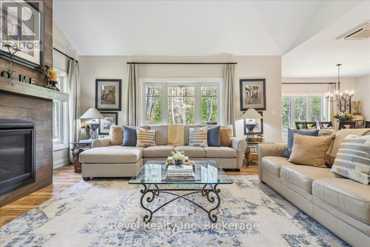 59 Trout Lane, Tiny, ON - Indoor Photo Showing Living Room With Fireplace