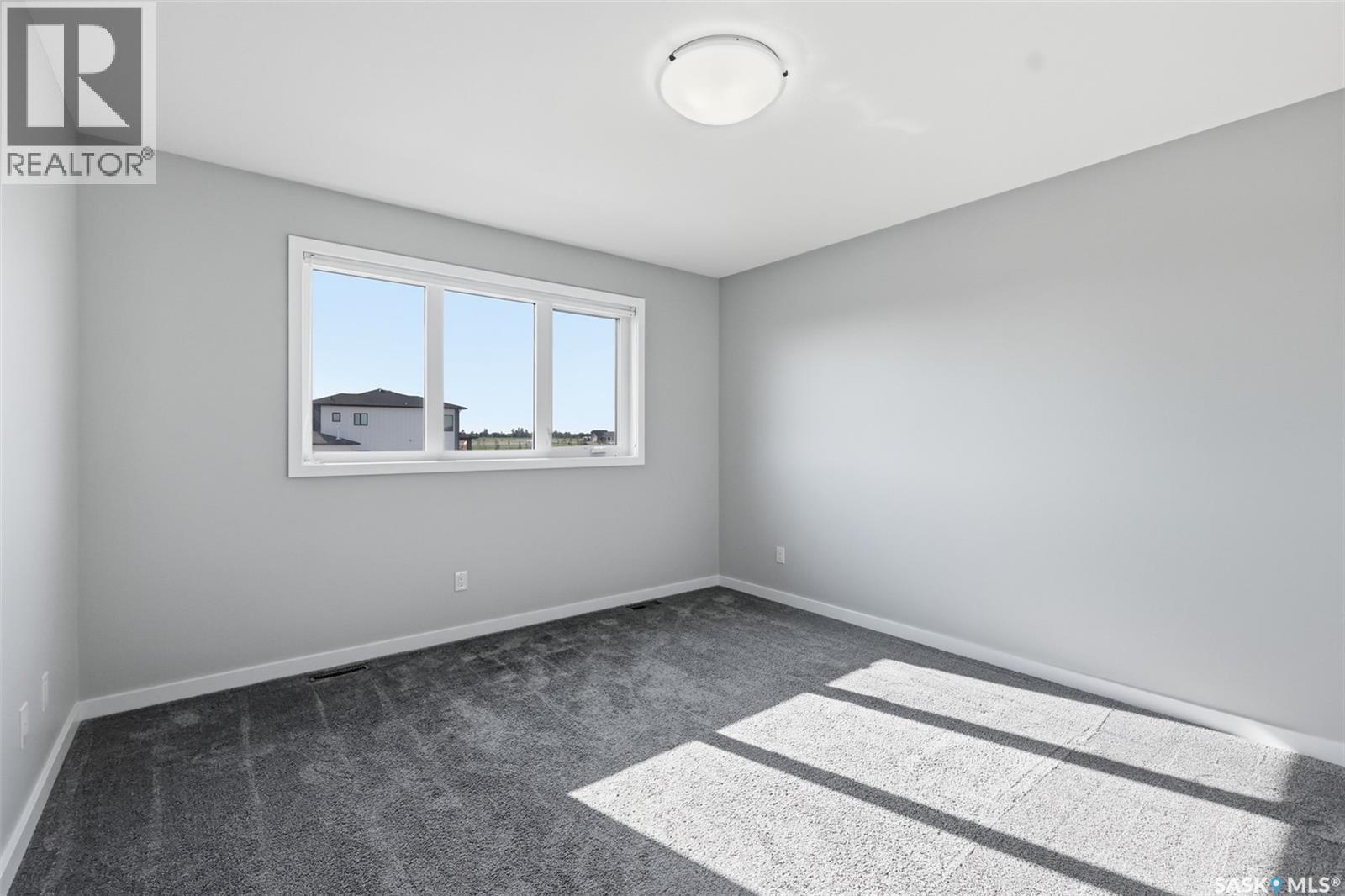 812 1St Avenue N, Warman, SK - Indoor Photo Showing Other Room