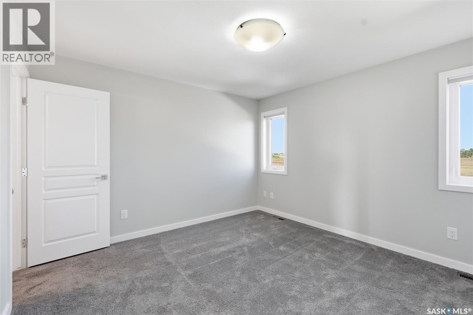 812 1St Avenue N, Warman, SK - Indoor Photo Showing Other Room