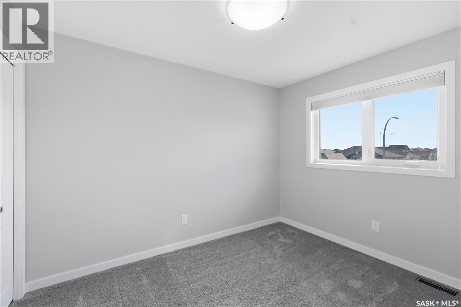 812 1St Avenue N, Warman, SK - Indoor Photo Showing Other Room