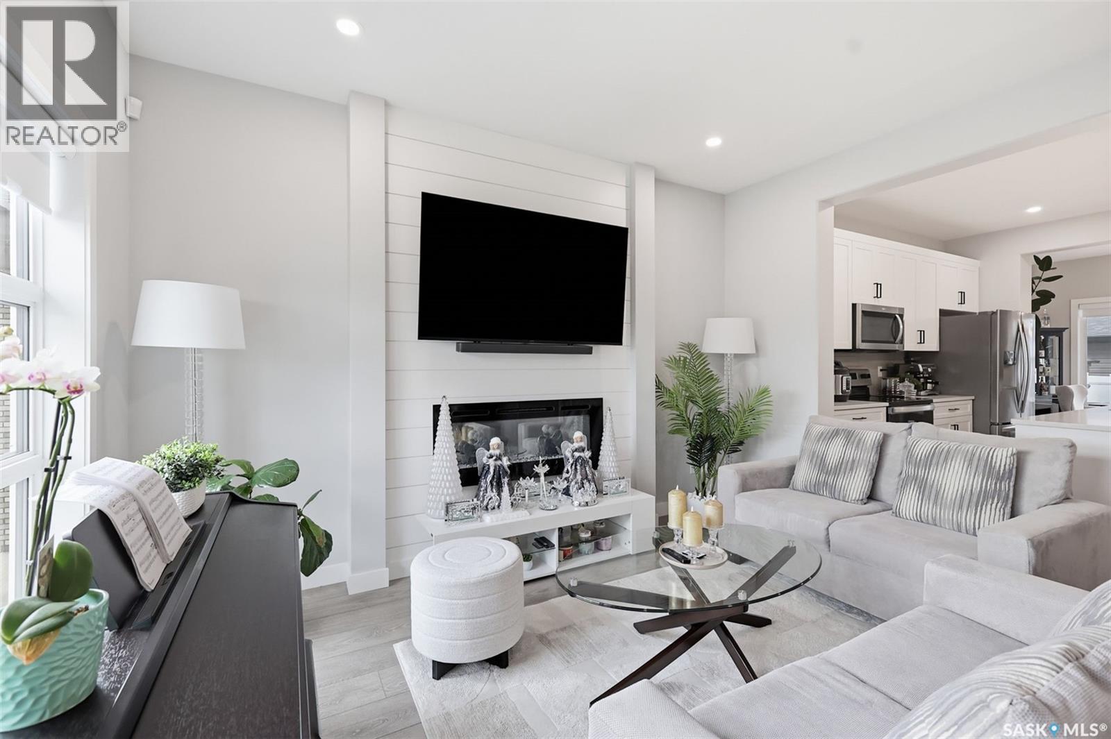 258 Brighton Boulevard, Saskatoon, SK - Indoor Photo Showing Living Room With Fireplace