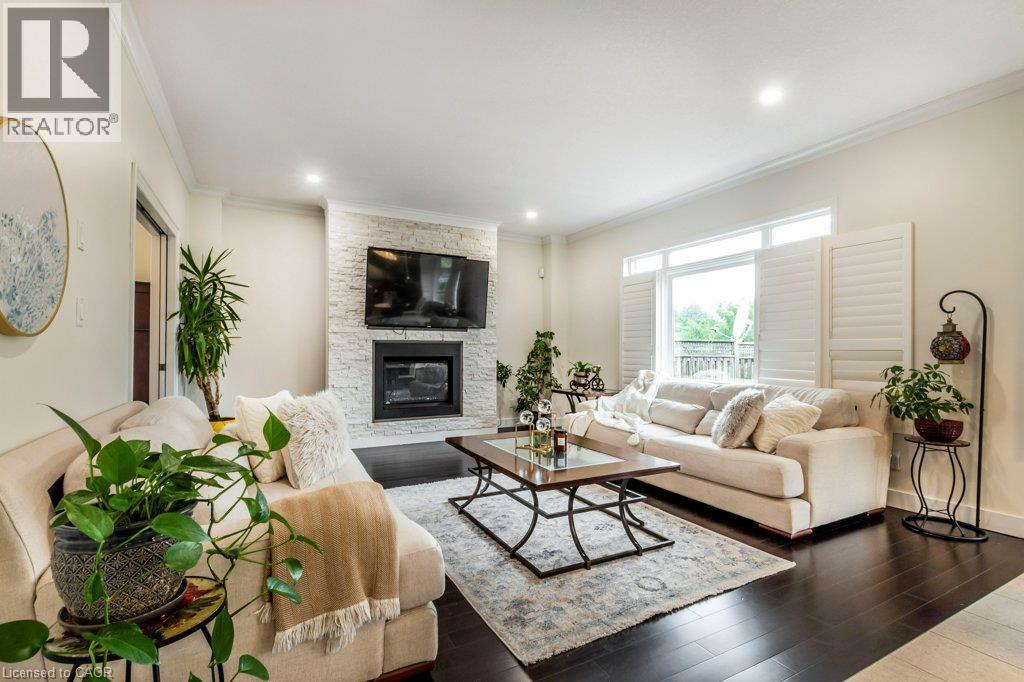 14 Anastasia Drive, Kitchener, ON - Indoor Photo Showing Living Room With Fireplace