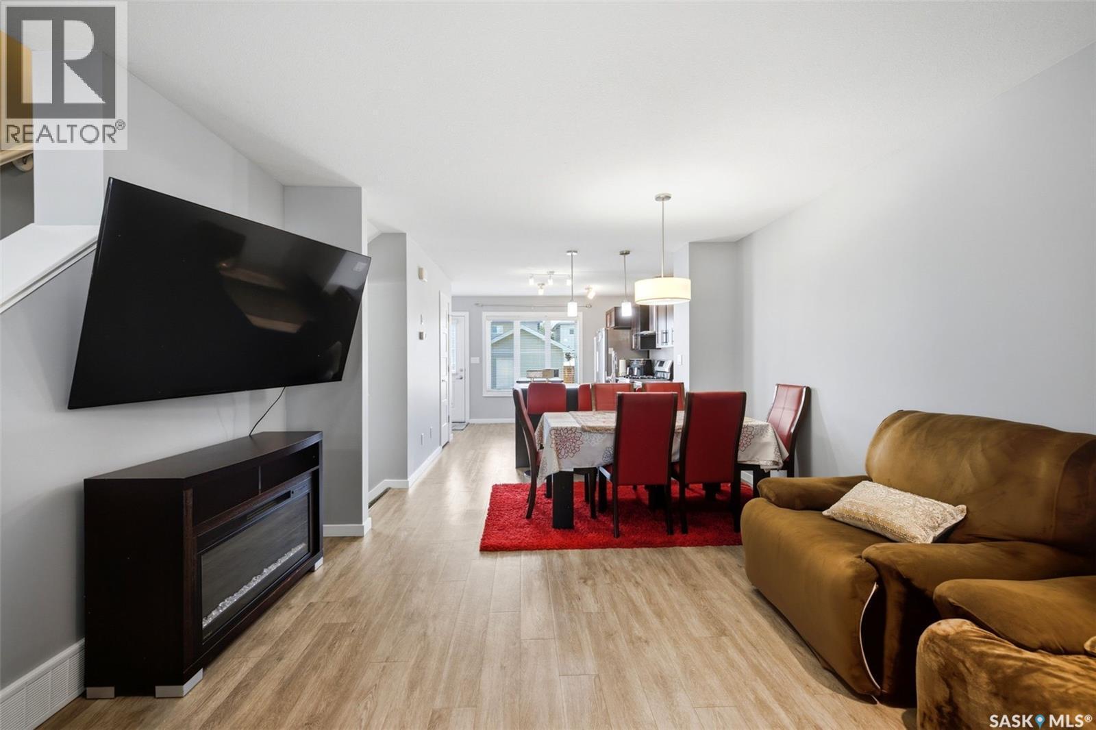 4606 Albulet Drive, Regina, SK - Indoor Photo Showing Living Room With Fireplace