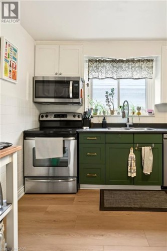 107 Reid Avenue N, Hamilton, ON - Indoor Photo Showing Kitchen With Stainless Steel Kitchen With Double Sink