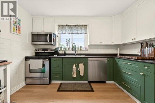 107 Reid Avenue N, Hamilton, ON - Indoor Photo Showing Kitchen With Stainless Steel Kitchen With Double Sink