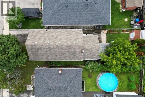 107 Reid Avenue N, Hamilton, ON - Outdoor With Above Ground Pool