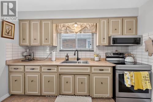 49 Brookstream Court, Hamilton, ON - Indoor Photo Showing Kitchen With Double Sink