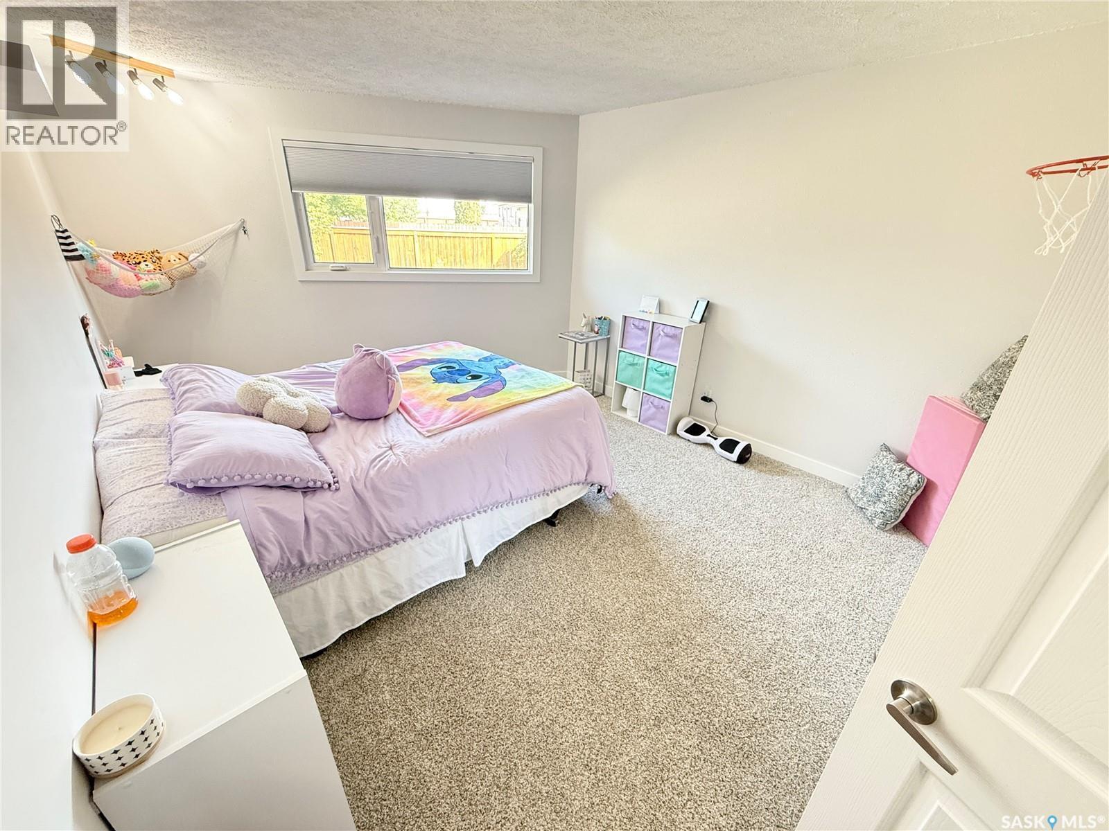 3 Mclelland Bay, Weyburn, SK - Indoor Photo Showing Bedroom