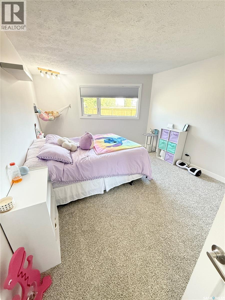 3 Mclelland Bay, Weyburn, SK - Indoor Photo Showing Bedroom