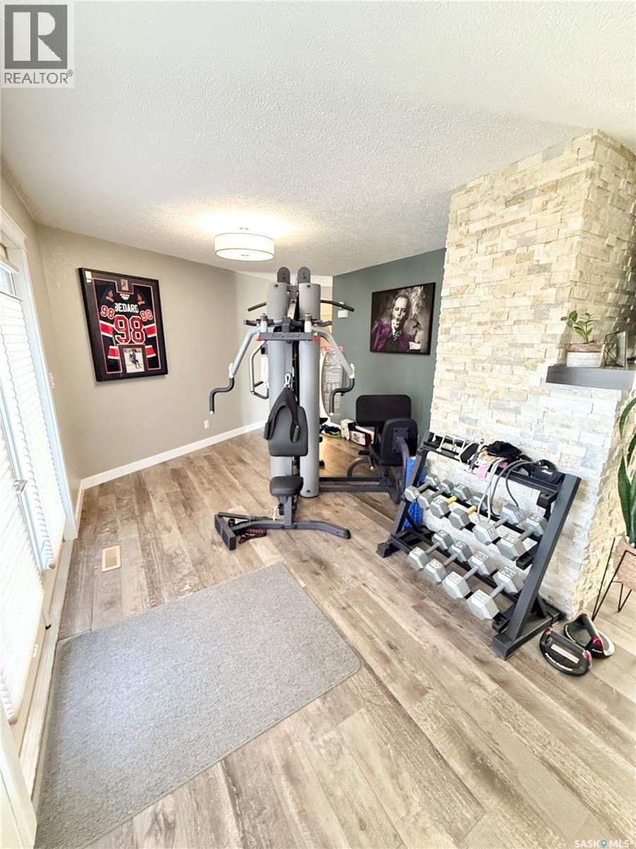 3 Mclelland Bay, Weyburn, SK - Indoor Photo Showing Gym Room