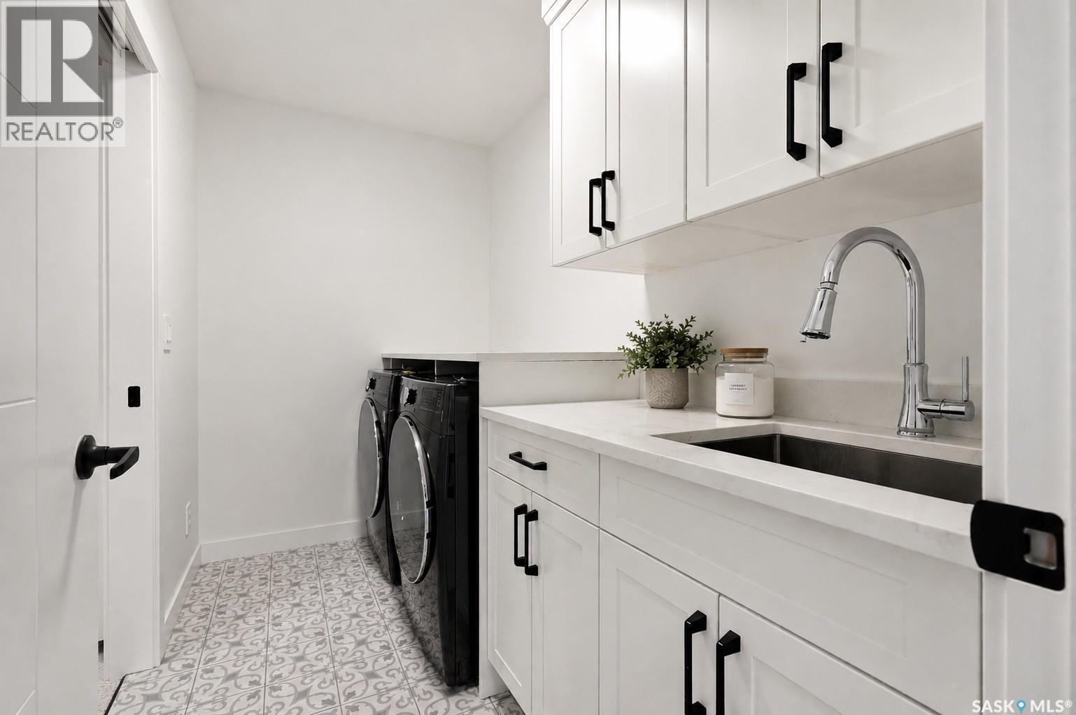 302 Chelsom Manor, Saskatoon, SK - Indoor Photo Showing Laundry Room