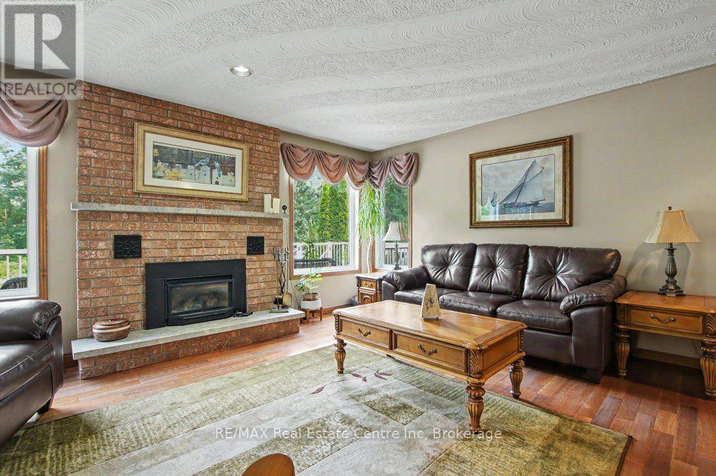 283 German School Road, Brant (Paris), ON - Indoor Photo Showing Living Room With Fireplace