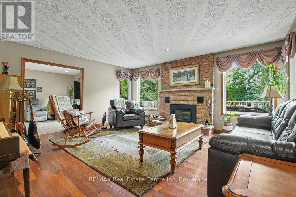 283 German School Road, Brant (Paris), ON - Indoor Photo Showing Living Room With Fireplace