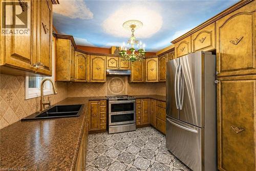 218 Macaulay Street E, Hamilton, ON - Indoor Photo Showing Kitchen With Double Sink