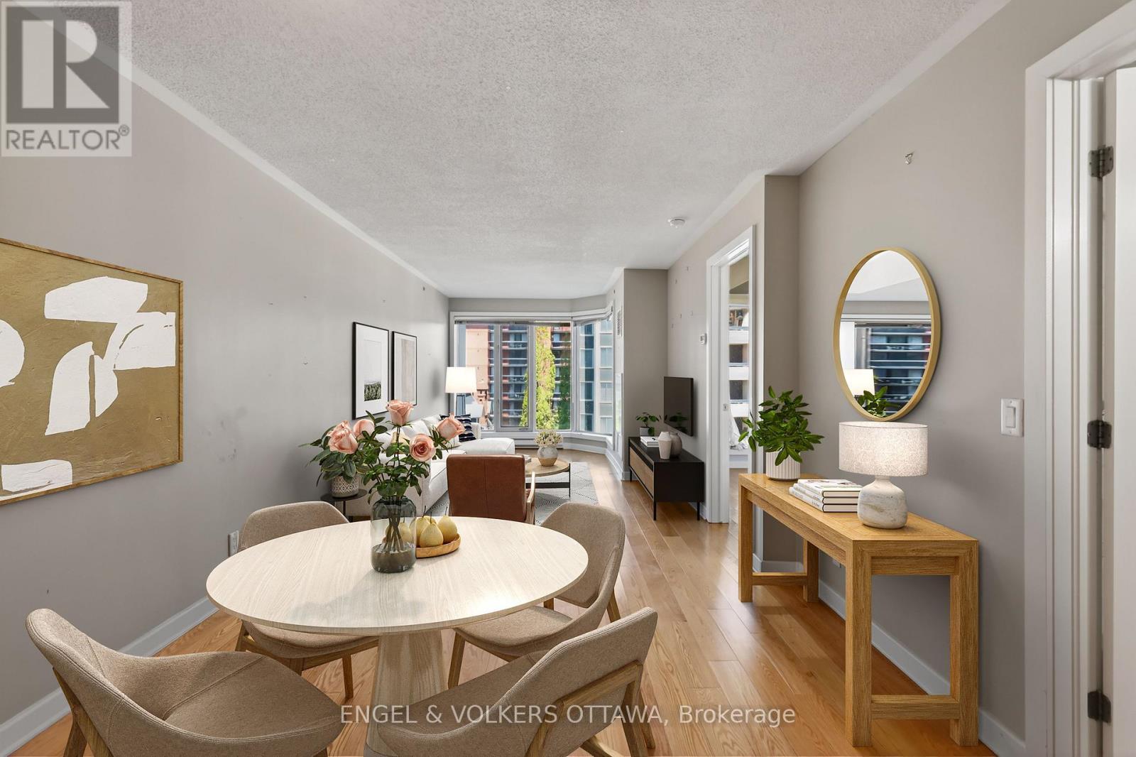 This image has been virtually staged. - 604 - 138 Somerset Street W, Ottawa, ON - Indoor Photo Showing Dining Room