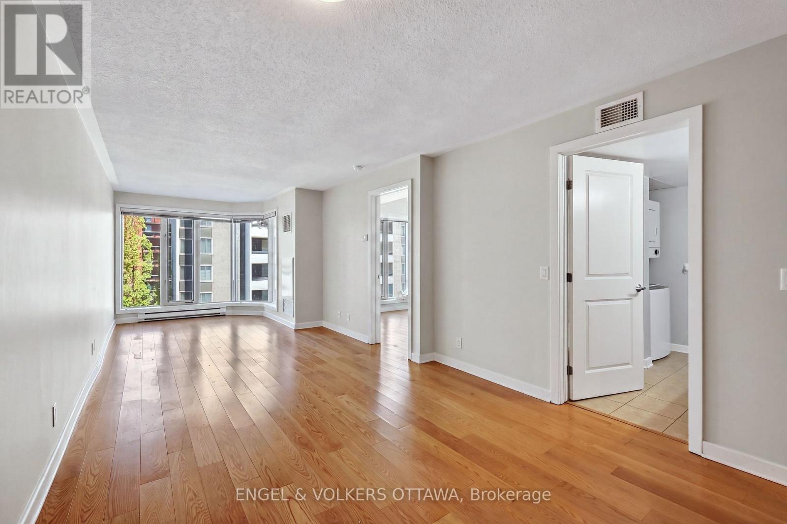 This image has been virtually staged. - 604 - 138 Somerset Street W, Ottawa, ON - Indoor Photo Showing Other Room