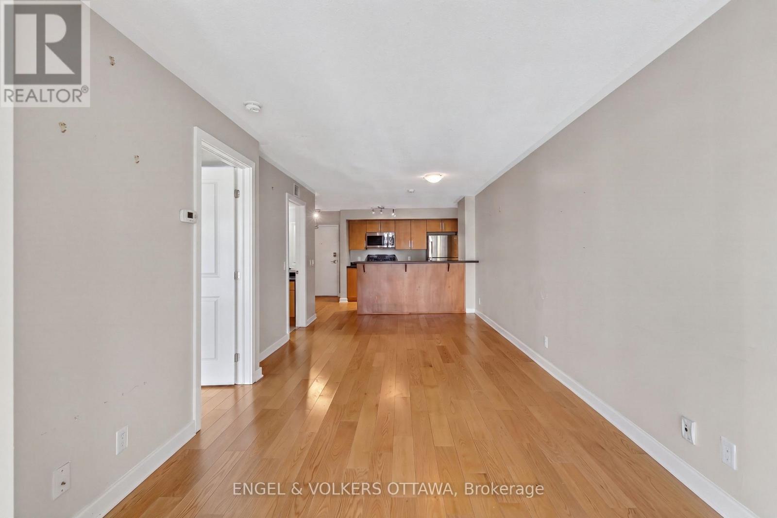 This image has been virtually staged. - 604 - 138 Somerset Street W, Ottawa, ON - Indoor Photo Showing Other Room