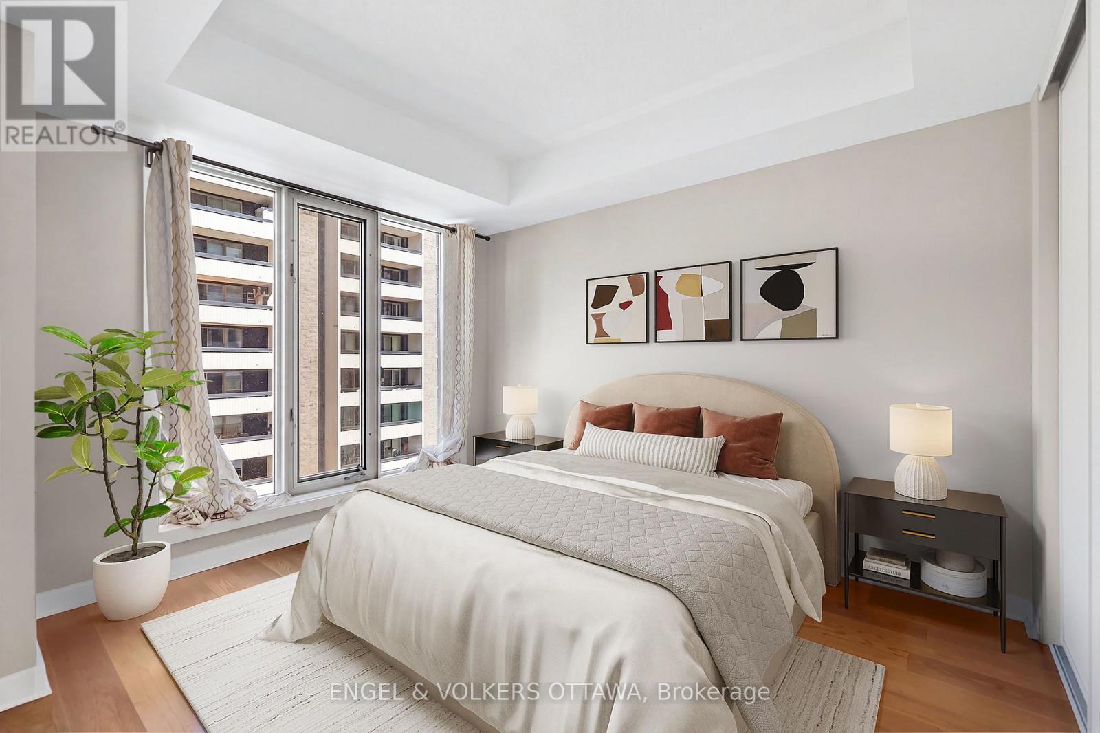 This image has been virtually staged. - 604 - 138 Somerset Street W, Ottawa, ON - Indoor Photo Showing Bedroom
