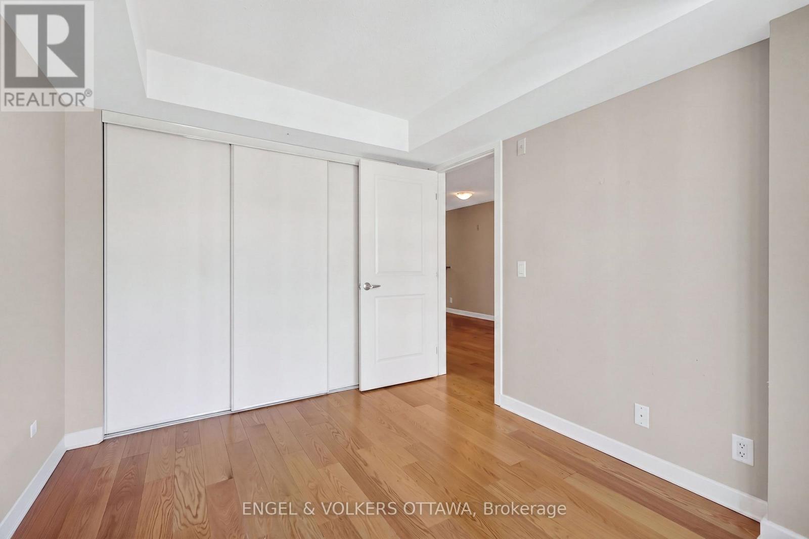 This image has been virtually staged. - 604 - 138 Somerset Street W, Ottawa, ON - Indoor Photo Showing Other Room