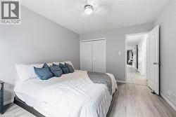 Light gray walls with a ceiling-mounted light fixture -