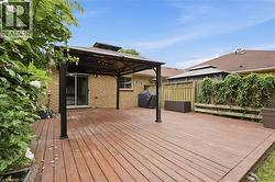 Expansive wood deck with a metal gazebo -