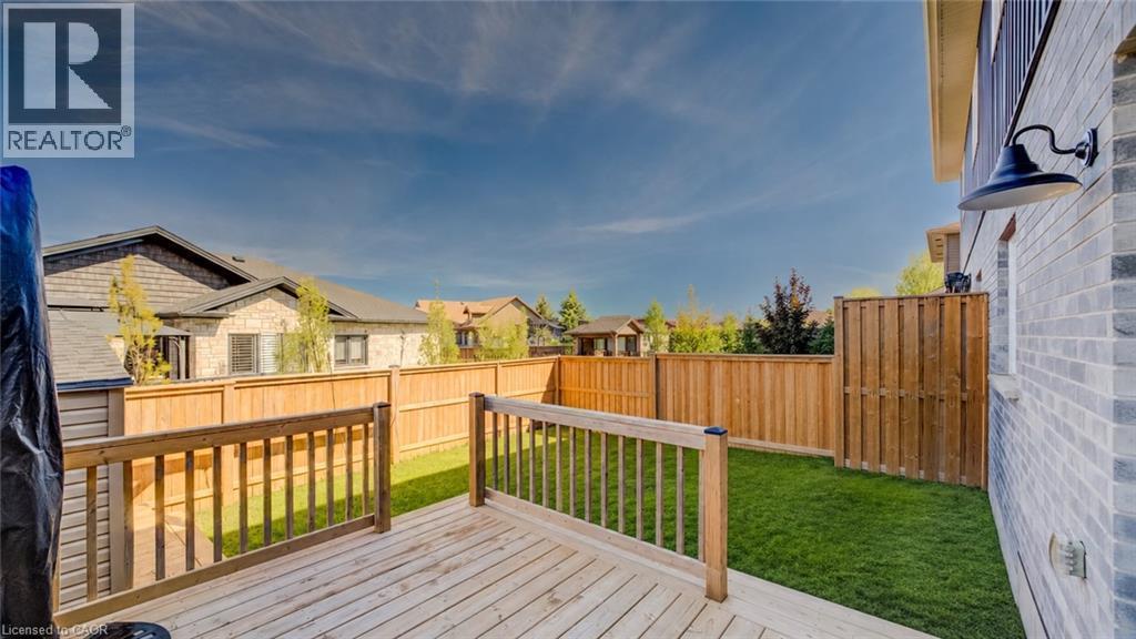 Edited using AI to remove play centre - not included - 117 Sarah Road, Mount Forest, ON - Outdoor With Deck Patio Veranda