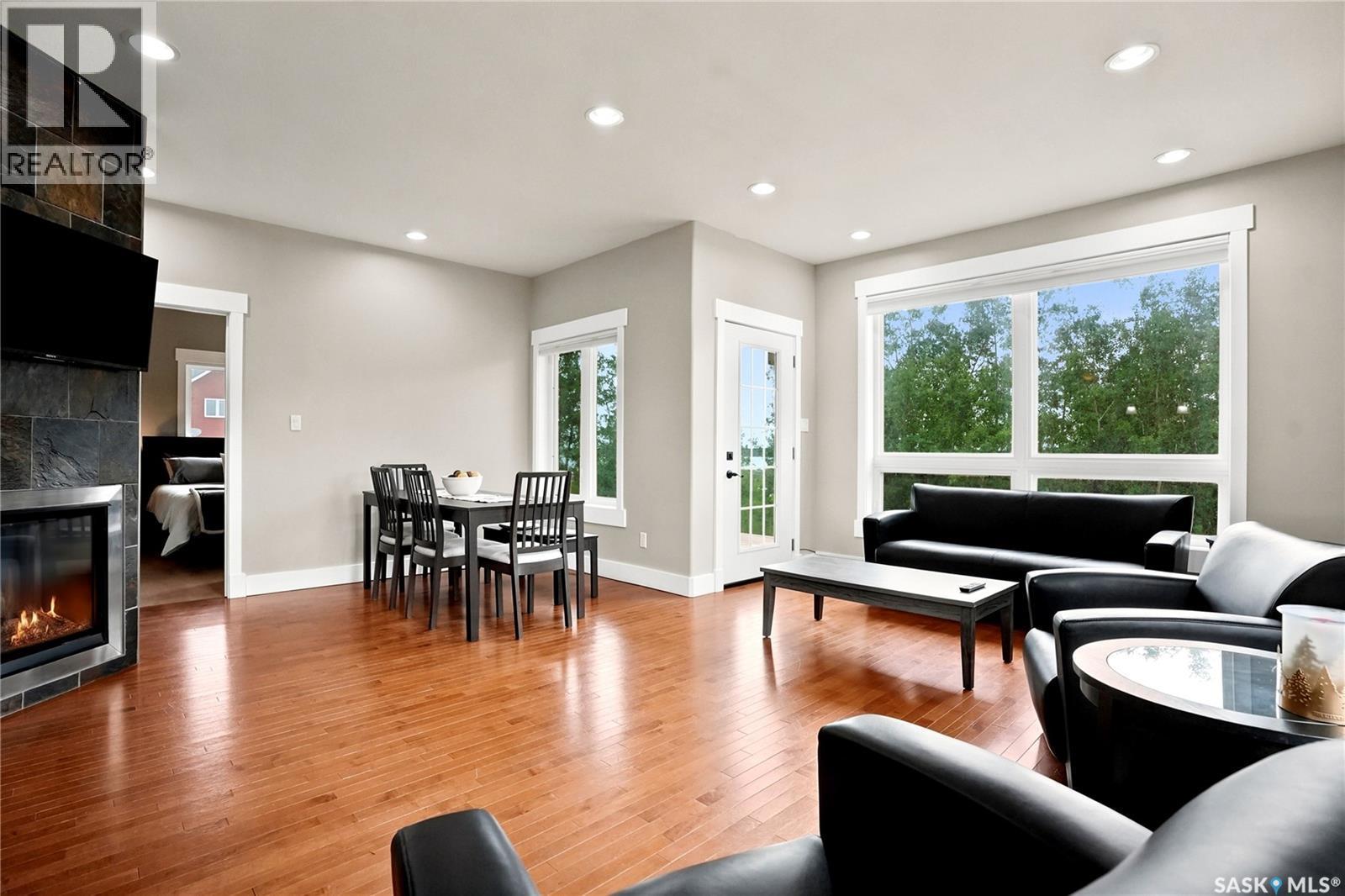 311 Ravine Road, Big Shell, SK - Indoor Photo Showing Living Room With Fireplace