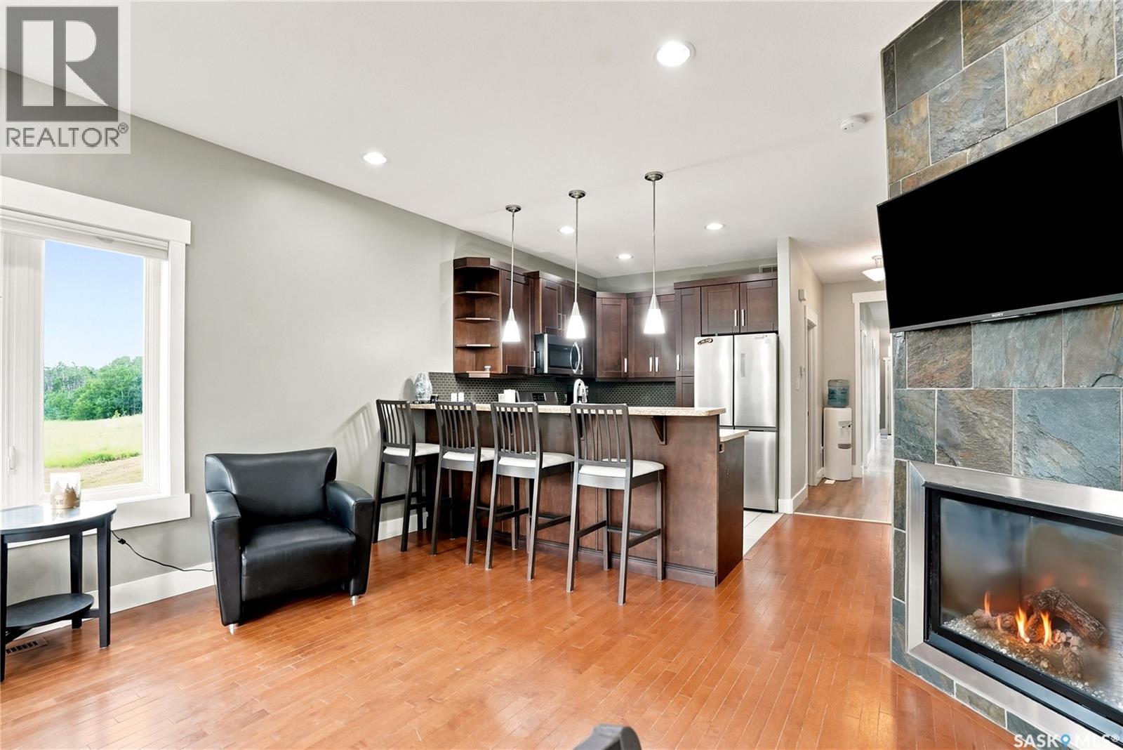 311 Ravine Road, Big Shell, SK - Indoor With Fireplace