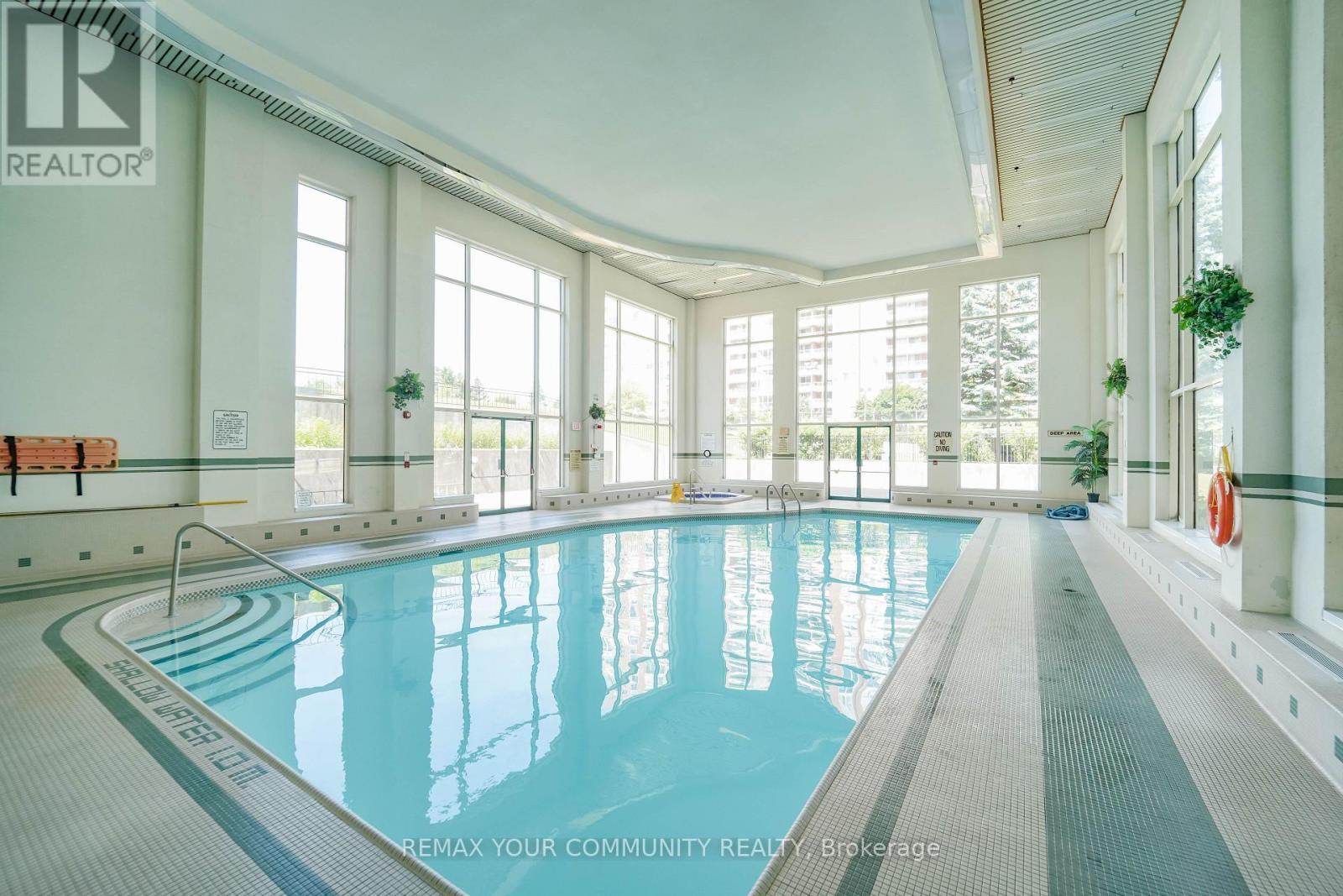 Pool + Hot Tub - 103 - 410 Mclevin Avenue, Toronto, ON - Indoor Photo Showing Other Room With In Ground Pool