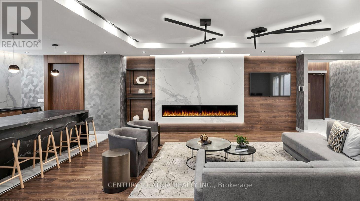 2919 - 275 Village Green Square, Toronto, ON - Indoor Photo Showing Other Room With Fireplace